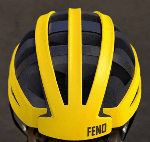 Fend helmet in yellow top view showing FEND logo on front of helmet