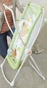 Fisher-Price Rock-n-Play Portable Bassinet in lime green folding up