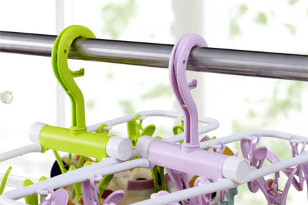 Inoutdoorkit Folding Travel Clip & Drip Laundry Drying Hanger Rack both green and light purple open hanging closeup