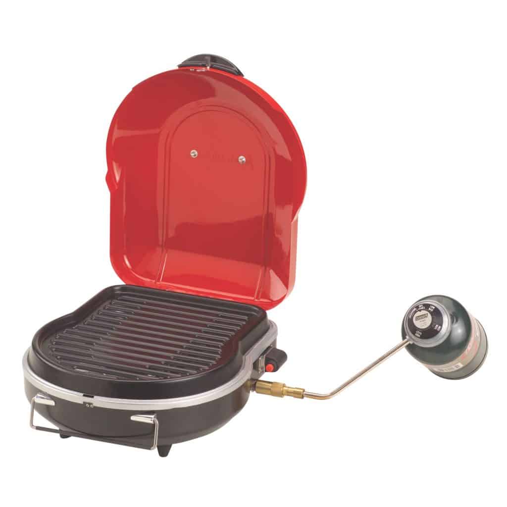 Coleman Fold-N-Go+ Instastart Grill in red open with propane tank attached