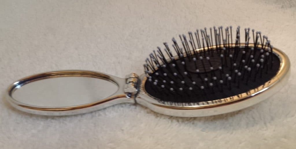 Wet Brush in silver lying flat open